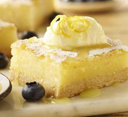 Lemon Bars with Cream and Blueberries