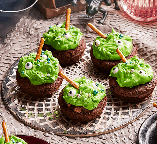 witch's brownie cauldron served on a designer plate